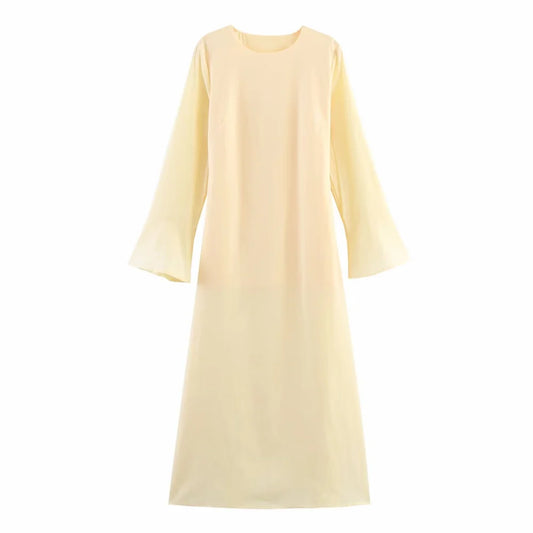 Light yellow dress with long sleeves on a white background